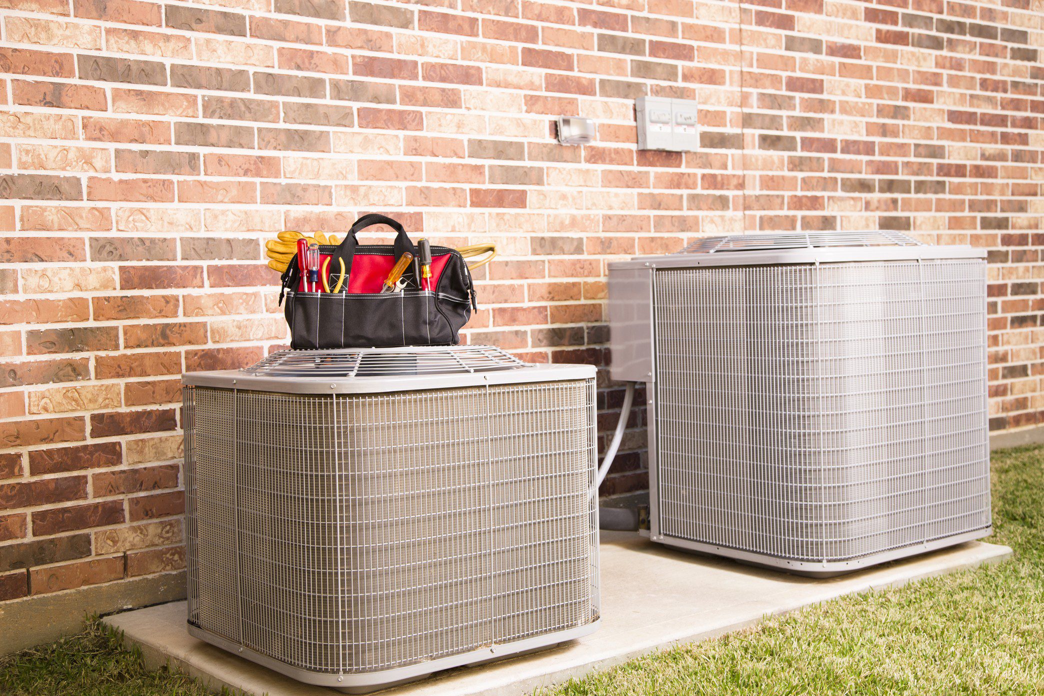 Two air conditioners and maintenance tools