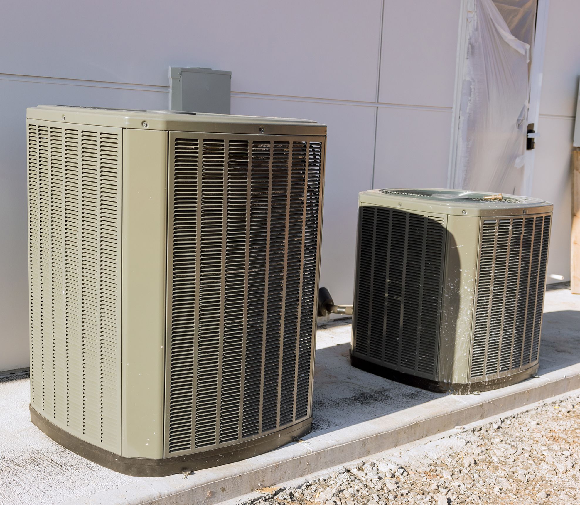Outdoor air conditioning units beside building