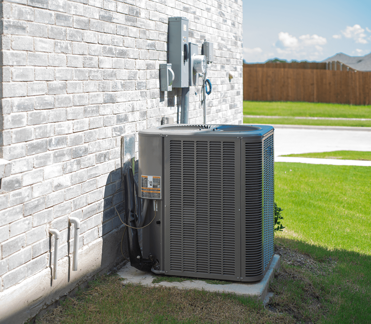 Exterior AC unit on concrete pad